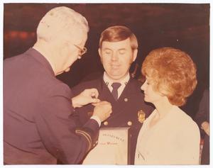 Primary view of object titled '[Harold W. Minter Receiving an Award]'.