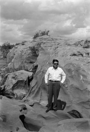 [Man in Front of Rock Formation]