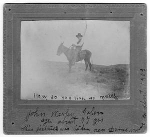 John Wesley Gober Riding a Mule