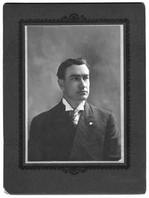 [Unidentified man with tie and stiff collar]