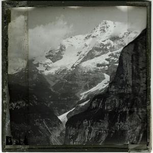 Glass Slide of Snow-Capped Mountains