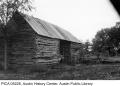 Photograph: [Exterior of Log Cabin at Bohl's Place]
