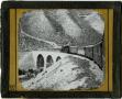 Photograph: Glass Slide of Train Bound for Damascus Crossing a Bridge