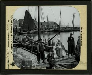 Primary view of object titled 'Glass Slide of Dutch Children on a Dock'.