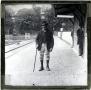 Photograph: Glass Slide of Man at Train Station