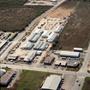 Thumbnail image of item number 1 in: 'Aerial Photograph of Abilene Lumber & Truss Plant (Abilene, Texas)'.