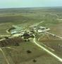 Photograph: Aerial Photograph of Livestock Auction Barn (Callahan County, Texas)