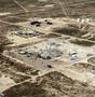 Thumbnail image of item number 1 in: 'Aerial Photograph of Conoco Petroleum Plant in Western Texas'.
