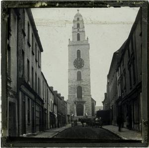 Glass Slide of Clock Tower in Front of Unidentified Church (Europe)
