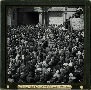 Primary view of object titled 'Glass Slide of Crowded Court of the Church  of the Holy Sepulchre (Jerusalem)'.