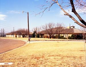 Photograph of Residential Houses on Curving Street (Abilene, Texas)
