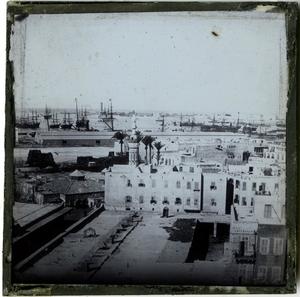 Primary view of object titled 'Glass Slide of Coastline of Alexandria, Egypt with Sailing Ships  in Background'.