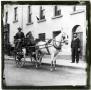 Photograph: Glass Slide of Man and Boy in Horse Drawn Cart