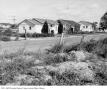 Thumbnail image of item number 1 in: '[Houses on North Loop Boulevard]'.