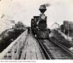 Thumbnail image of item number 1 in: '[Train on Waller Creek Bridge]'.