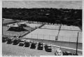 Photograph: [Aerial view of courts and seats at Caswell Tennis Center]