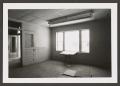 Photograph: [Empty Room with Plywood Floors]