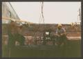 Primary view of [Construction Workers on Metal Tank]