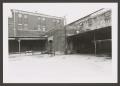 Photograph: [North Corner of Courtyard Outside the Dr. Pepper Museum]