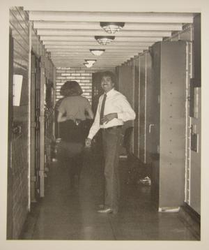 [Sheriff Captain Tony J. Casarez and a female guard in the cellblock hallway of the Travis County Jail]