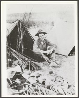 [Soldier Sitting by Tent]