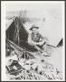 Photograph: [Soldier Sitting by Tent]