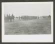 Photograph: [Cavalry Men Marching in Field]