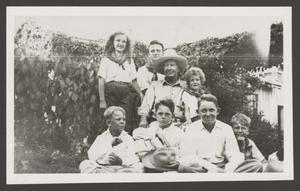 Primary view of object titled '[Hill family surrounding Lon C. Hill]'.