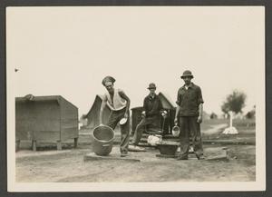 Primary view of object titled '[Three Soldiers Doing Dishes]'.