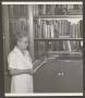 Photograph: [Miss Paul Hill in Library]