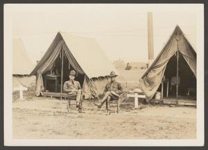 [Two Men of the 14th Calvary Sitting in Front of Tents]