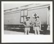 Photograph: [Two Soldiers by Train]