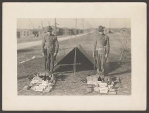 [Two Soldiers Standing Outside a Tent]
