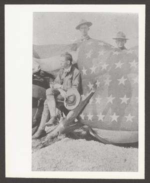 [Three Soldiers With U.S. Flag]