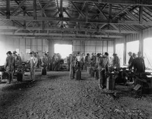 Primary view of object titled 'Soldiers blacksmithing at Camp Mabry'.