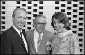 Primary view of object titled '[Waggoner Carr, Rhea Howard, and Woman Pose at Democratic Convention]'.