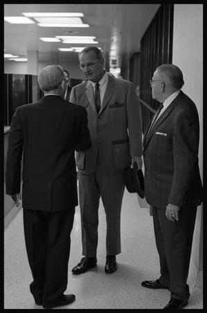 Primary view of object titled '[Rhea Howard Guides President Johnson Through Newsroom]'.