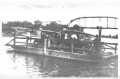 Photograph: [Automobiles on the Richmond Ferry across the Brazos River]