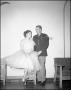 Photograph: [Jim Cochran and Woman Rest During Military Ball]