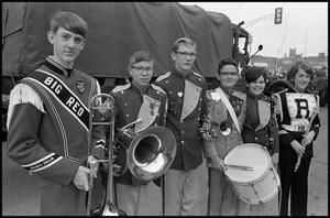 [Different School Marching Band Members Pose at Armed Forces Day Parade]
