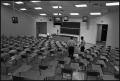 Photograph: [Two Men Standing in M.U. Science Building Lecture Hall]