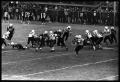 Photograph: [Football Teams in Motion]