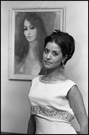 [Mrs. Robert Wagner Poses Next to Female Painting]