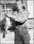 Photograph: [Jim Cochran Holds Up Fish]