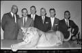Photograph: [Charles Hipp Poses With His Lion and Group]