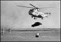 Photograph: [Air Force Helicopter Lifts Car at Sheppard AFB 25th Anniversary]