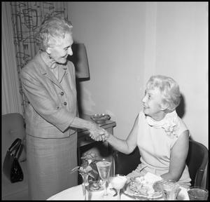 [Muriel Humphrey Shakes Hand With Woman]