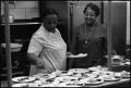 Photograph: [Two Women Preparing Food at the Day Care Center]