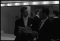 Photograph: [Van Cliburn Speaks With Gentleman in Dressing Room]