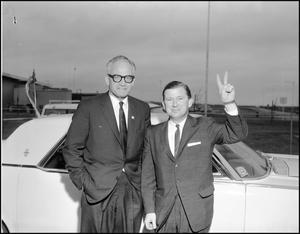 Primary view of object titled '[Goldwater and Tower Meet at Airport]'.